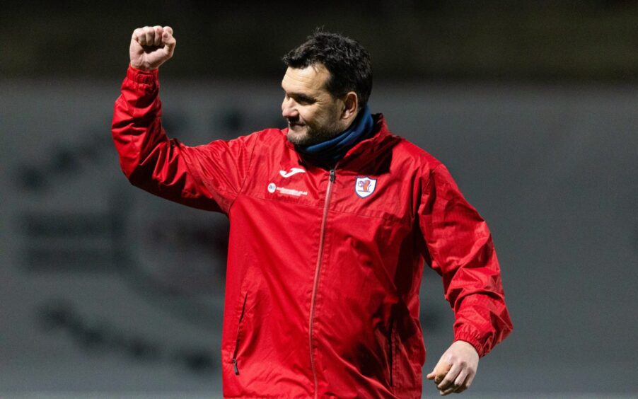 Raith Rovers manager Ian Murray raises a clenched fist in the direction of supporters as he celebrates the recent win over Dundee United.