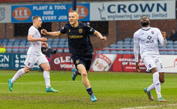 Scott Tiffoney celebrates after opening the scoring. Image: SNS