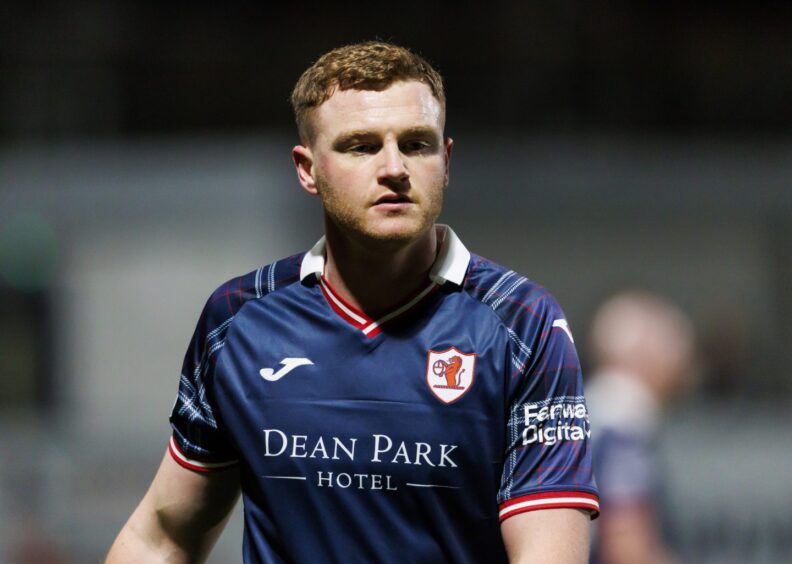 Raith Rovers defender James Brown stands still during a match.