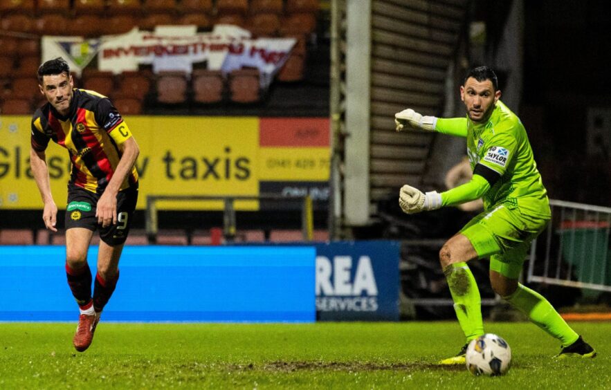 Brian Graham heads Partick Thistle into the lead.