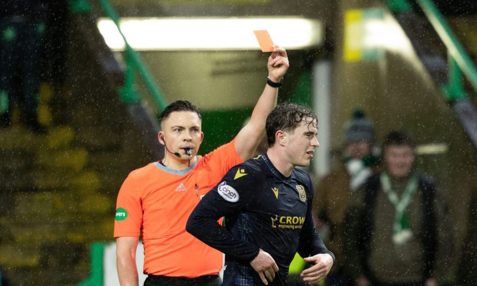 Fin Robertson is shown a red card at Celtic Park. Image: SNS