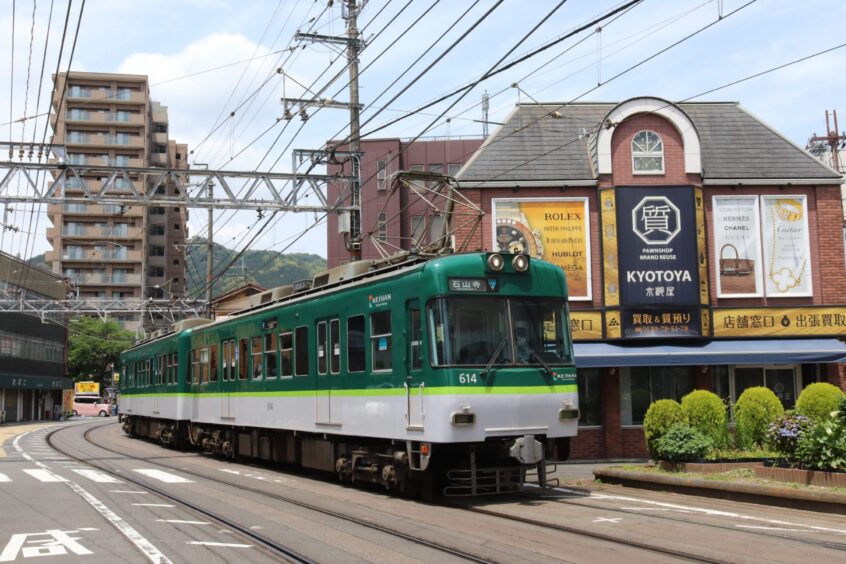 A far-flung shot from Japan, as a train passes buildings