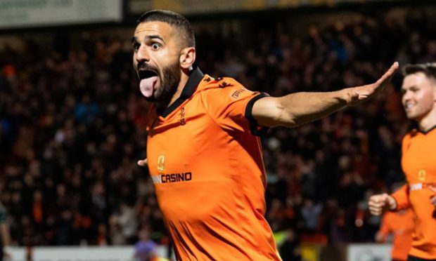 Aziz Behich celebrates a Dundee United goal