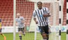 Dunfermline Athletic defender Malachi Fagan-Walcott is full of smiles as he wheels away after scoring his first senior goal.
