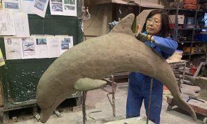 Local artist, Fanny Christie working on the Broughty Ferry Dolphin Sculptures. Image: Fanny Christie
