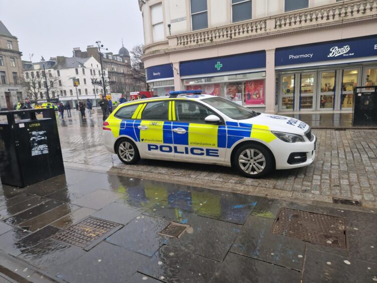 Police on Reform Street in Dundee. 