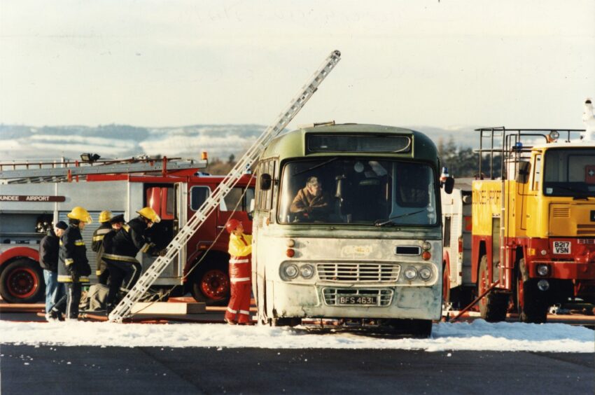 A ladder leaning on a bus during the 1996 exercise. 