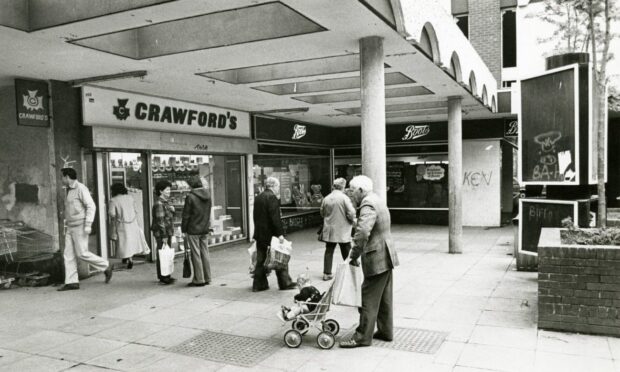 People outside The Crawford bakery and Boots at the back of the Highgate in 1983.