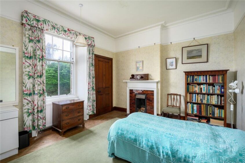  The bedroom décor is outdated in St Andrews Victorian home for sale 