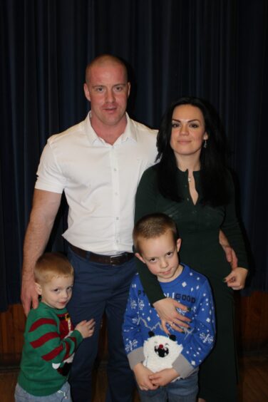 Bodybuilder John with family. 