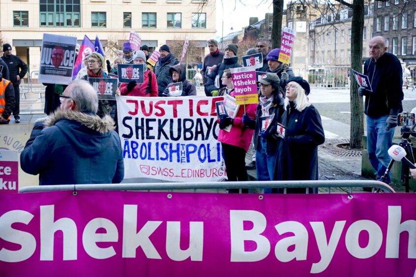 Supporters of Sheku Bayoh outside Capital House