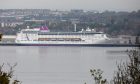 The 700ft Ambition cruise ship will return to Dundee this year, after docking in the city for the first time in 2023. Image: Kim Cessford/DC Thomson