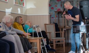 Paul Cooney entertaining residents with songs from the sixties at Orchar Nursing Home in Broughty Ferry. Image: Kim Cessford/DC Thomson