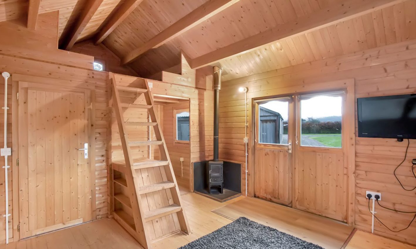 The interior of one of the chalets. Both have wood burning stoves.