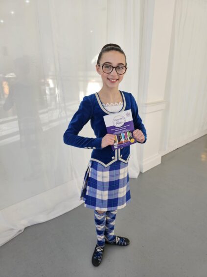 Millie Nicolson in Scottish country dancing outfit