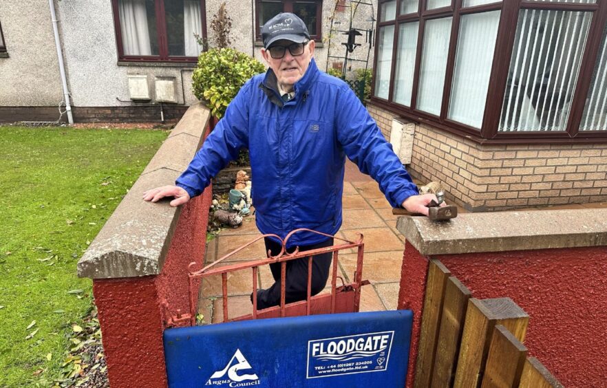 Brechin OAP puts up floodgate ahead of Storm Babet.