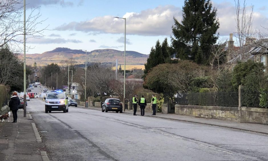 Police on Strathmartine Road in Dundee.