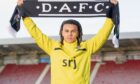 Livingston defender Miles Welch-Hayes hold a scarf above his head after signing on loan Dunfermline Athletic F.C.