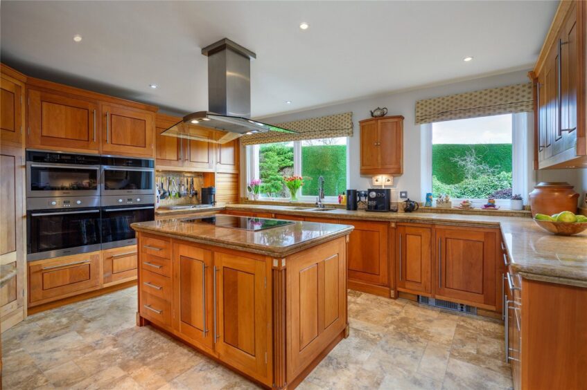 A kitchen island sits at the centre of the room in St Andrews family home 
