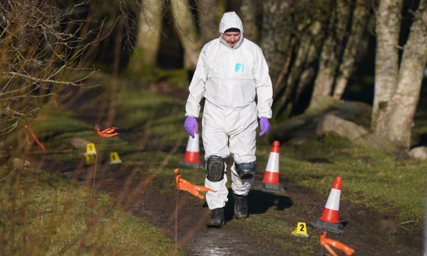 Forensics officers at the scene of Brian Low's shooting near Aberfeldy. Image: Andrew Milligan/PA Wire