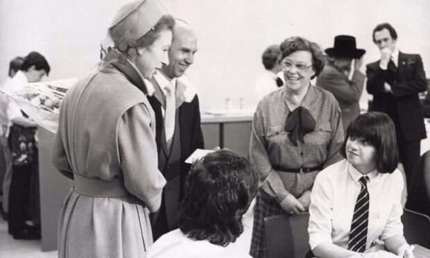 Ella Beveridge with Princess Anne and Arbroath High School rector John Whyte in 1985.