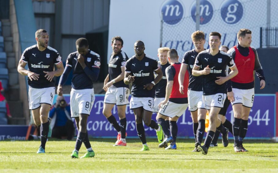 Glen Kamara and Dundee celebrate a last-minute winner against St Johnstone in 2018. Image: SNS