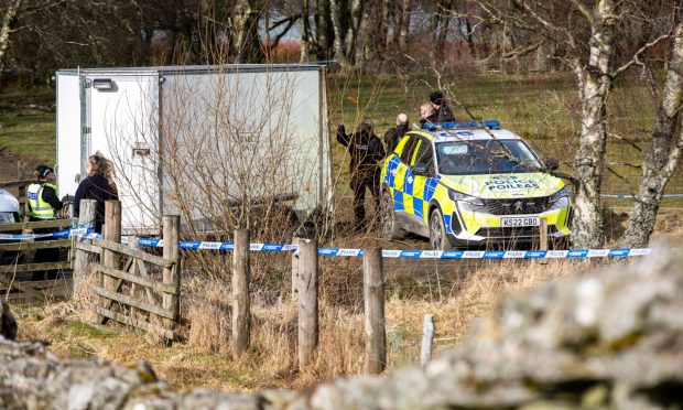 Police and forensic officers near Aberfeldy after Brian Low's death. Image: Steve Brown/DC Thomson