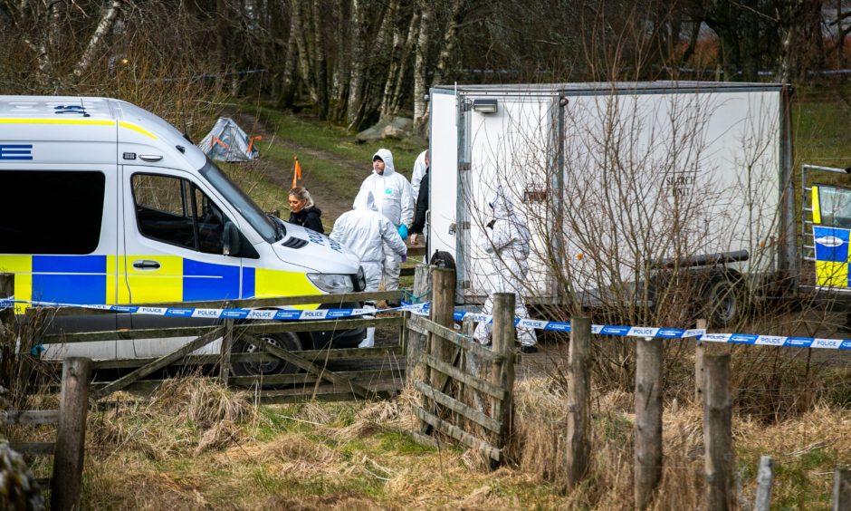 Police and forensics officers at the scene of Brian Low's murder near Aberfeldy.
