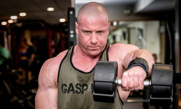 Carnoustie bodybuilder John Craig working out.