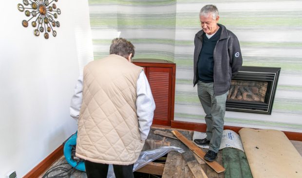 Margaret and Councillor Tom Adams inspect the damage at her Buckhaven home