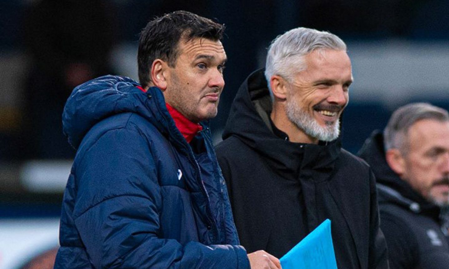 Raith Rovers boss Ian Murray and Dundee United manager Jim Goodwin share a laugh on the sidelines.