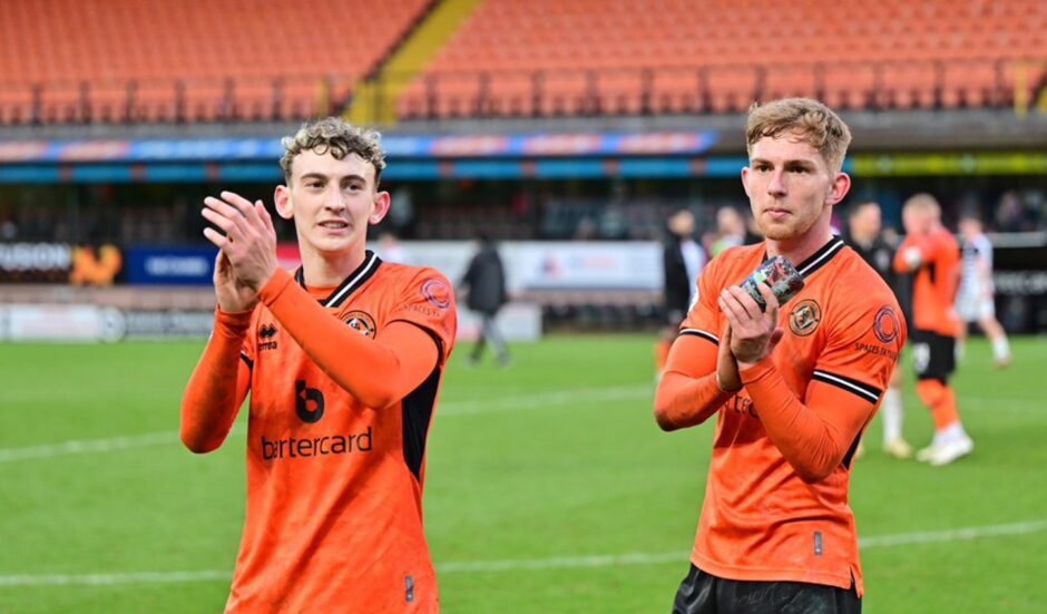 Academy graduates Miller Thomson, left, and Kai Fotheringham take the acclaim of Dundee United supporters.