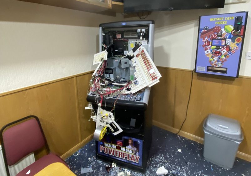 The damage to a fruit machine at Thornton Bowling Club.