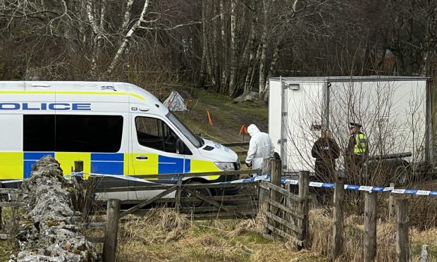 Forensics officers arrived at the Aberfeldy murder scene on Wednesday. Image: Steve Brown/DC Thomson