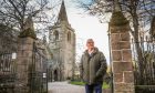 Bob Christie outside Brechin's 800-year-old cathedral.