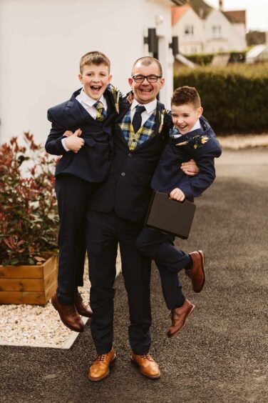 Steven with step-sons Daniel (left) and Blair (right). 