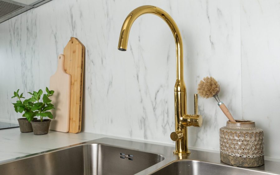 brass tap on kitchen sink