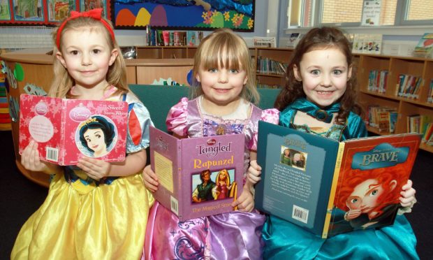 Amy Stewart, Abbie Tucker and Cara Nicols dress up at Ballumbie PS in 2013. Image: DC Thomson.