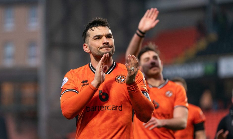 Tony Watt takes the acclaim of the Dundee United fans