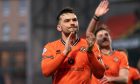 Tony Watt takes the acclaim of the Dundee United fans