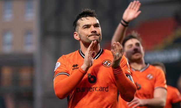 Tony Watt takes the acclaim of the Dundee United fans