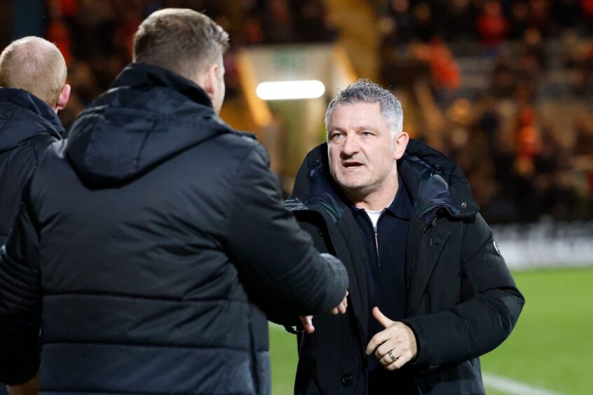 Dundee boss Tony Docherty meets Aberdeen interim Peter Leven ahead of kick-off. Image: Shutterstock