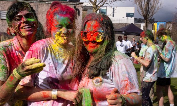 Vibrant hues unite as students joyfully celebrate Holi at the University of Dundee. Image: Paul Reid