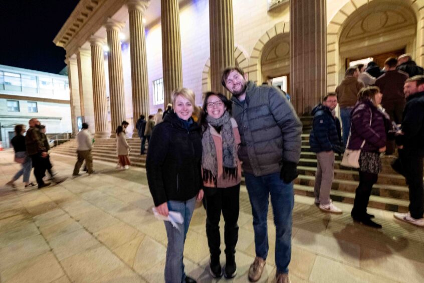 Isla Roy, Judith Flockhart and Elliot Flockhart outside Caird Hall, Dundee, before the show by Professor Brian Cox