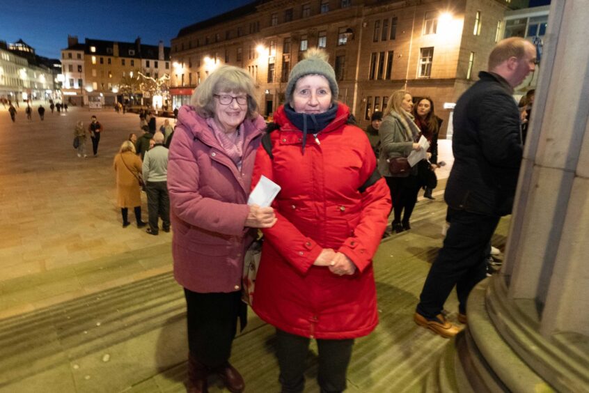Veronica Deans and Caroline Morrison wait eagerly to enter the Caird Hall.