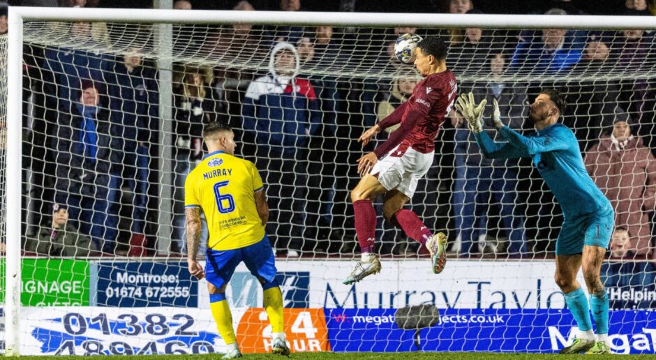 Leighton McIntosh leaps to head in for Arbroath as he gets in between Raith Rovers pair Euan Murray and Kevin Dabrowski.