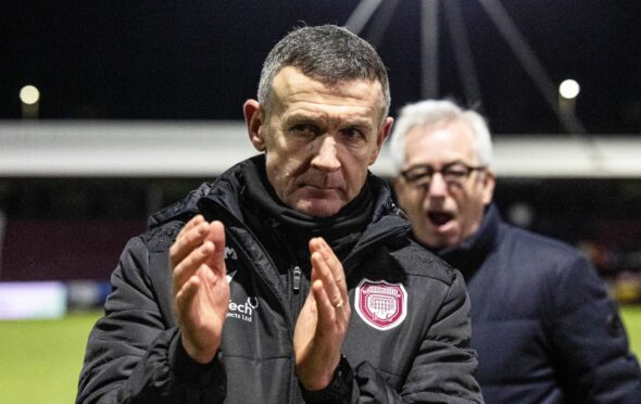 Arbroath manager Jim McIntyre applauds fans at full-time against Raith Rovers. Image: Mark Scates/SNS