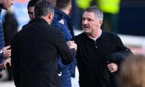 Dundee boss Tony Docherty with Derek McInnes ahead of kick off. Image: SNS