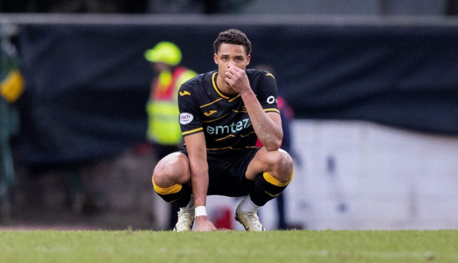 Livingston's Tete Yengi looks dejected after drawing with St Johnstone. 