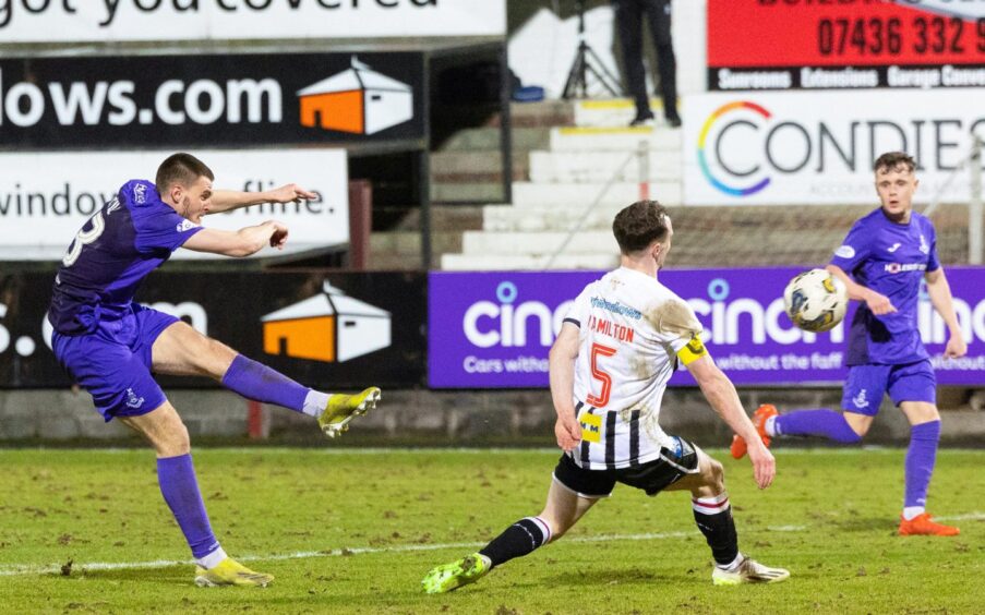 Gabby McGill extends his left foot to fire in a stunning second goal for Airdrie against DAFC.